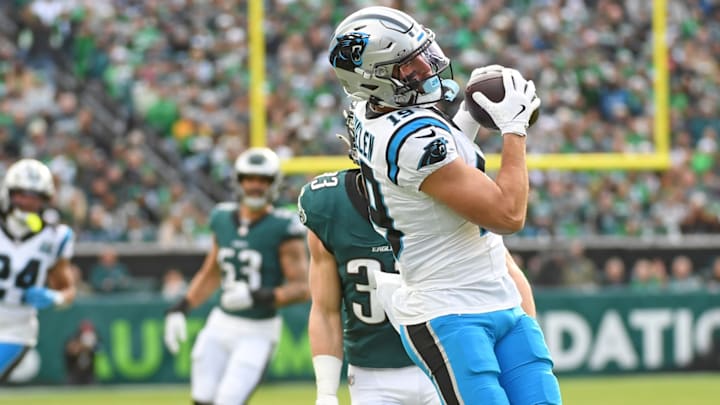 Dec 8, 2024; Philadelphia, Pennsylvania, USA; Carolina Panthers wide receiver Adam Thielen (19) makes a catch against Philadelphia Eagles cornerback Cooper DeJean (33) during the first quarter at Lincoln Financial Field. 