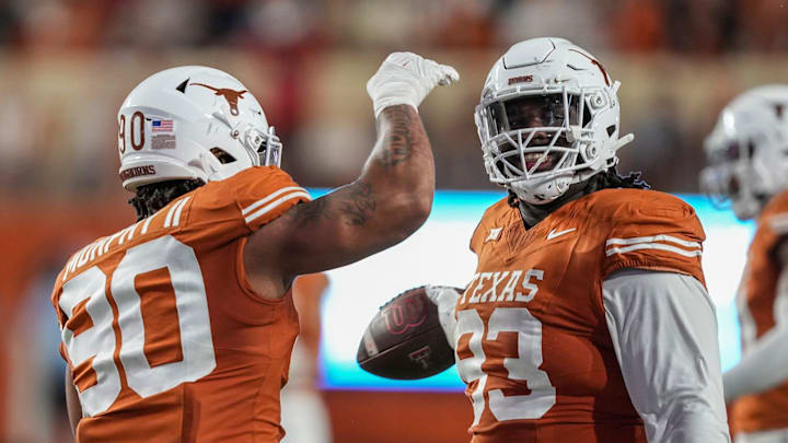 Texas Longhorns defensive lineman T'Vondre Sweat and Byron Murphy