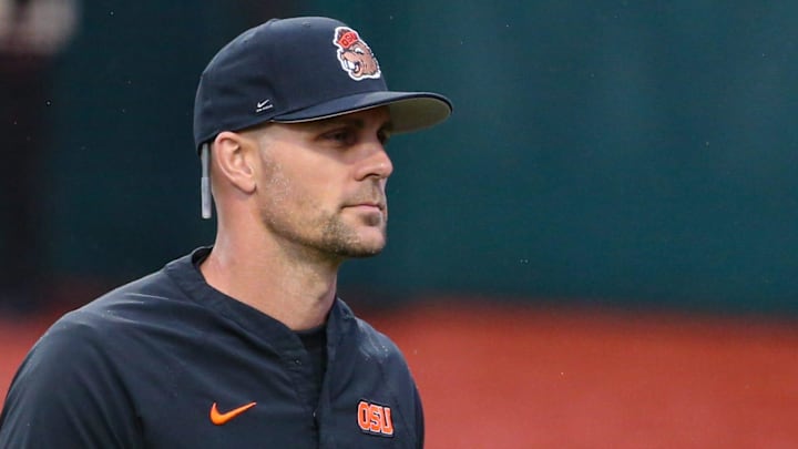 Oregon State head coach Mitch Canham heads to the dugout before an NCAA college baseball game at Goss Stadium on Friday, March 6, 2026, in Corvallis, Ore.