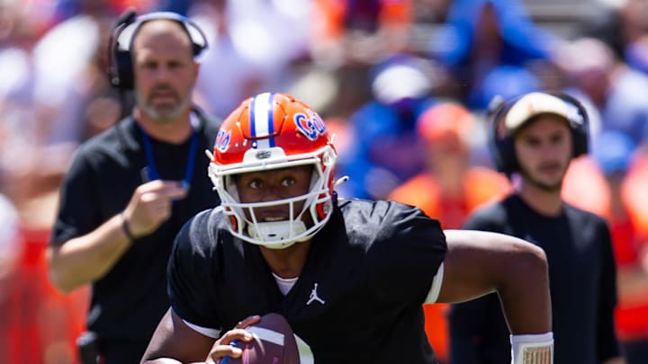 Florida Gators quarterback DJ Lagway (2) rolls out of the pocket.