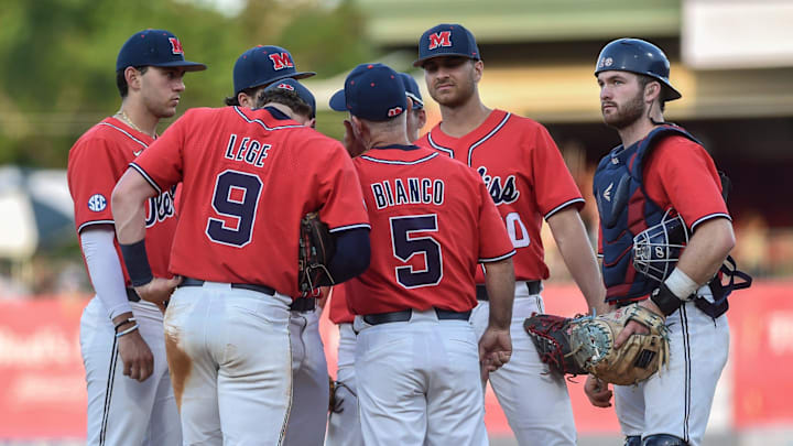 Head coach Mike Bianco (5) huddles with his players during the Ole Miss vs. Mississippi State Governor's Cup baseball game at Trustmark Park in Pearl, Miss., Tuesday, April 25, 2023.

TCL OleMissvMSU205