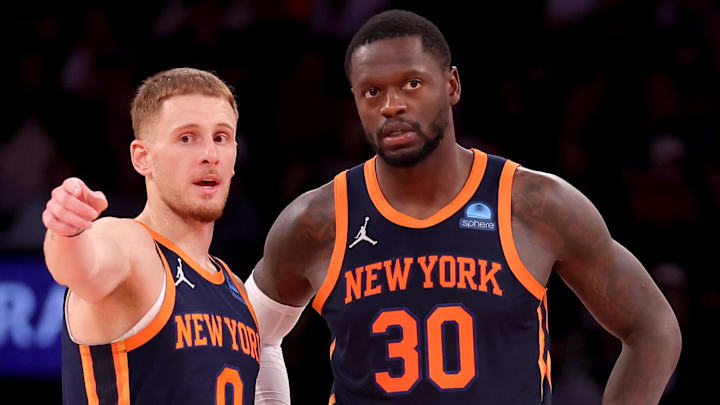 Nov 1, 2023; New York, New York, USA; New York Knicks guard Donte DiVincenzo (0) talks to forward Julius Randle (30) during the fourth quarter against the Cleveland Cavaliers at Madison Square Garden. Mandatory Credit: Brad Penner-Imagn Images