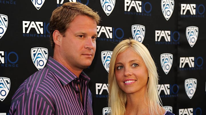 Southern California Trojans coach Lane Kiffin (left) and wife Layla Kiffin (right).