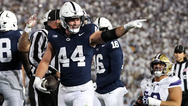 Penn State Nittany Lions tight end Tyler Warren (44) reacts after scoring a touchdown against the Washington Huskies during the second quarter at Beaver Stadium. Mandatory Credit: Matthew O'Haren-Imagn Images