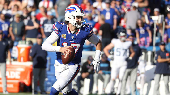 Bills quarterback Josh Allen runs laterally looking for an open receiver during second half action at Highmark Stadium in Orchard Park on Oct. 20, 2024.