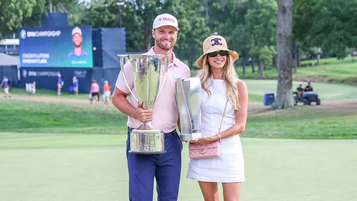 Wyndham Clark of the United States celebrates with his girlfriend, Emily Tanner during the final round of the BMW Championship at Bellerive Country Club in St. Louis, Missouri. Wyndham Clark of the United States celebrates with his girlfriend, Emily Tanner during the final round of the BMW Championship at Bellerive Country Club in St. Louis, Missouri.