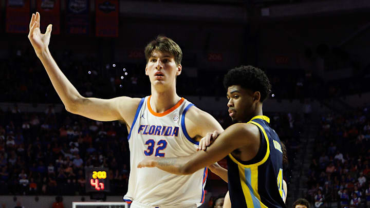 Florida Gators center Olivier Rioux (32) made college basketball history against Merrimack. Florida Gators center Olivier Rioux (32) made college basketball history against Merrimack.