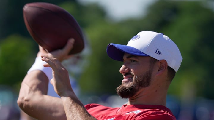 Bills back up quarterback Mitchell Trubisky warms up with the other quarterbacks before the start of practice on opening day of the Buffalo Bills training camp at St. John Fisher University in Pittsford on July 23, 2025.