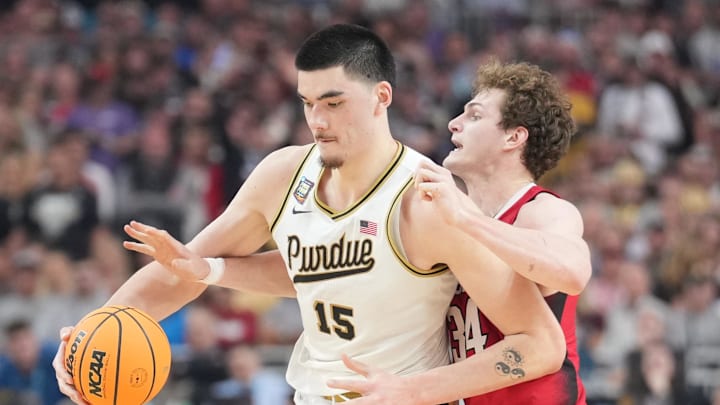 Apr 6, 2024; Glendale, AZ, USA; Purdue Boilermakers center Zach Edey (15) is defended by North