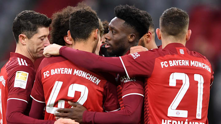 Bayern Munich's players celebrate a hard-fought 1-0 win against Arminia Bielefeld
