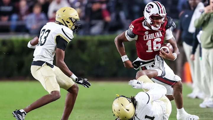 Nov 23, 2024; Columbia, South Carolina, USA; South Carolina Gamecocks quarterback LaNorris Sellers (16) runs the ball against the Wofford Terriers in the second half at Williams-Brice Stadium. Mandatory Credit: Jeff Blake-Imagn Images
