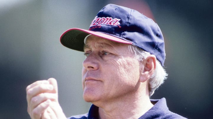 Sep 24, 1994; Stanford, CA, USA; FILE PHOTO; Arizona Wildcats head coach Dick Tomey clapping his hands during the game against the Stanford Cardinal at Stanford Stadium. Mandatory Credit: Imagn Images Sep 24, 1994; Stanford, CA, USA; FILE PHOTO; Arizona Wildcats head coach Dick Tomey clapping his hands during the game against the Stanford Cardinal at Stanford Stadium. Mandatory Credit: Imagn Images