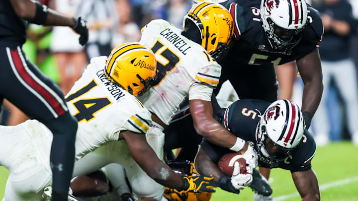 Nov 16, 2024; Columbia, South Carolina, USA; South Carolina Gamecocks running back Raheim Sanders (5) rushes for the game-winning touchdown with 15 seconds left in the game against the Missouri Tigers in the fourth quarter at Williams-Brice Stadium. Mandatory Credit: Jeff Blake-Imagn Images