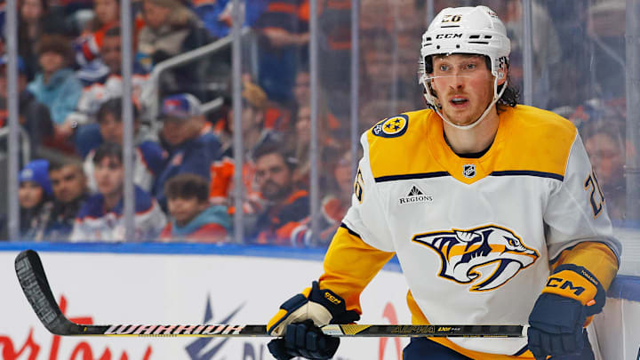 Nov 14, 2024; Edmonton, Alberta, CAN;  Nashville Predators forward Philip Tomasino (26) follows the play against the Edmonton Oilers at Rogers Place. Mandatory Credit: Perry Nelson-Imagn Images