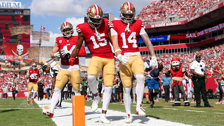 Nov 10, 2024; Tampa, Florida, USA; San Francisco 49ers wide receiver Ricky Pearsall (14) celebrates with wide receiver Jauan Jennings (15) after scoring a touchdown against the Tampa Bay Buccaneers in the first quarter at Raymond James Stadium. Mandatory Credit: Nathan Ray Seebeck-Imagn Images