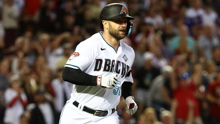 Nov 1, 2023; Phoenix, Arizona, USA; Arizona Diamondbacks first baseman Christian Walker (53) runs to first base after hitting a single against the Texas Rangers during the fifth inning in game five of the 2023 World Series at Chase Field. Mandatory Credit: Mark J. Rebilas-Imagn Images Nov 1, 2023; Phoenix, Arizona, USA; Arizona Diamondbacks first baseman Christian Walker (53) runs to first base after hitting a single against the Texas Rangers during the fifth inning in game five of the 2023 World Series at Chase Field. Mandatory Credit: Mark J. Rebilas-Imagn Images
