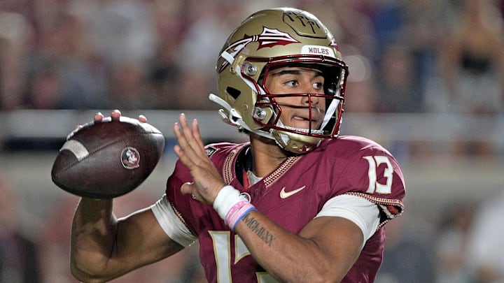 Oct 21, 2023; Tallahassee, Florida, USA; Florida State Seminoles quarterback Jordan Travis (13) looks to throw during the first half against the Duke Blue Devils at Doak S. Campbell Stadium. Mandatory Credit: Melina Myers-Imagn Images