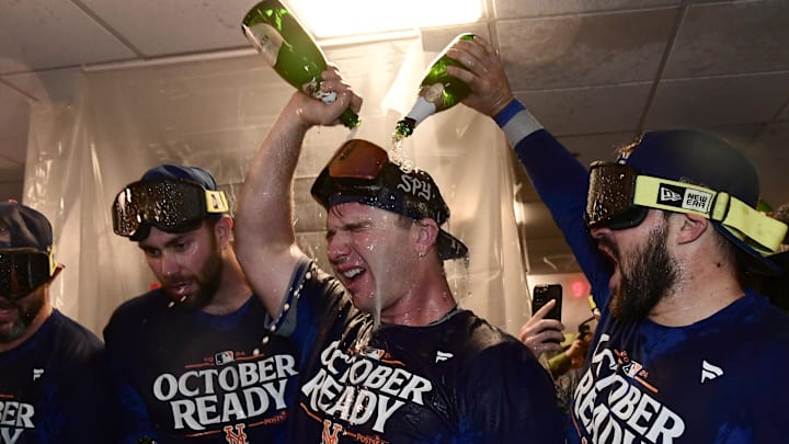 Oct 3, 2024; Milwaukee, Wisconsin, USA; New York Mets first baseman Pete Alonso (20) celebrates with teammates in the clubhouse after defeating the Milwaukee Brewers in game three of the Wildcard round for the 2024 MLB Playoffs at American Family Field. Oct 3, 2024; Milwaukee, Wisconsin, USA; New York Mets first baseman Pete Alonso (20) celebrates with teammates in the clubhouse after defeating the Milwaukee Brewers in game three of the Wildcard round for the 2024 MLB Playoffs at American Family Field.