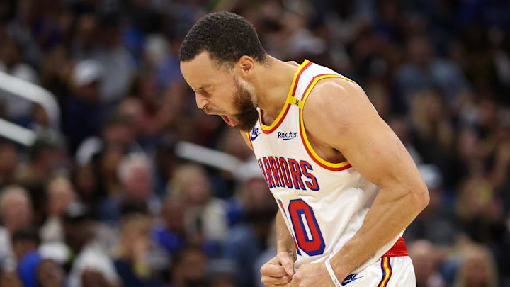 Feb 27, 2025; Orlando, Florida, USA; Golden State Warriors guard Stephen Curry (30) reacts after a basket against the Orlando Magic in the second quarter at Kia Center. Mandatory Credit: Nathan Ray Seebeck-Imagn Images