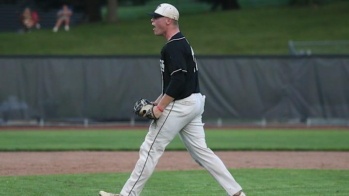 Ames’ pitcher Carter Geffre (17) reacts after a strikeout against Dowling Catholic during the seventh inning in the Class 4A baseball sub-state first round game at the George Cordaro Field on Friday, July 12, 2024, in West Des Moines, Iowa.