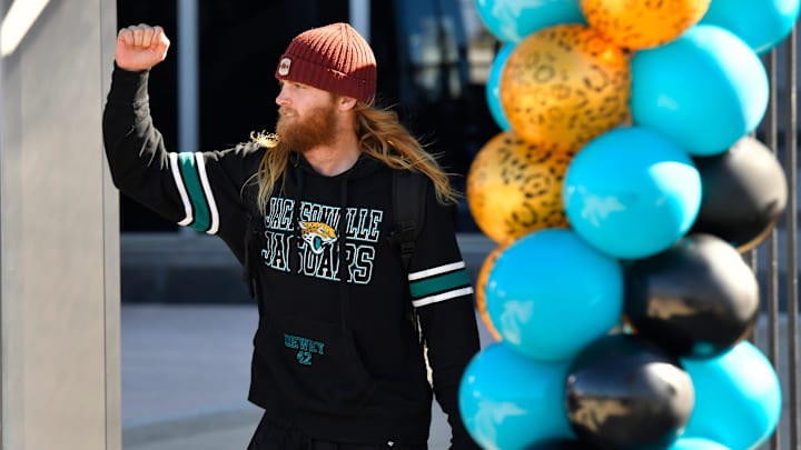 Jacksonville Jaguars safety Andrew Wingard (42) pumps his fist at fans as he leaves the stadium.