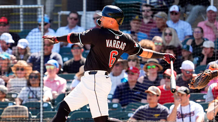 Arizona Diamondbacks Ildemaro Vargas hits a single against the Athletics in the second inning during a spring training game at Salt River Fields in Scottsdale on March 20, 2025.