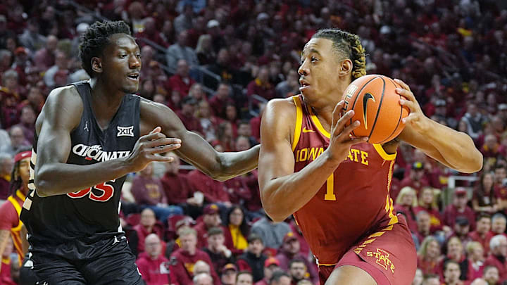 Iowa State Cyclones center Dishon Jackson (1) drives with the ball to the basket around Cincinnati Bearcats' forward Aziz Bandaogo (55) during the first half in the Big-12 men’s basketball at Hilton Coliseum on Feb. 15, 2025 in Ames, Iowa. Iowa State Cyclones center Dishon Jackson (1) drives with the ball to the basket around Cincinnati Bearcats' forward Aziz Bandaogo (55) during the first half in the Big-12 men’s basketball at Hilton Coliseum on Feb. 15, 2025 in Ames, Iowa.