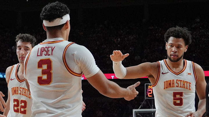 Iowa State Cyclones guard Tamin Lipsey (3)celebrates with Iforward Joshua Jefferson (5) and forward Milan Momcilovic (22) after a three-point play during the second half on Jan. 2, 2026, at Hilton Coliseum in Ames, Iowa. Iowa State Cyclones guard Tamin Lipsey (3)celebrates with Iforward Joshua Jefferson (5) and forward Milan Momcilovic (22) after a three-point play during the second half on Jan. 2, 2026, at Hilton Coliseum in Ames, Iowa.