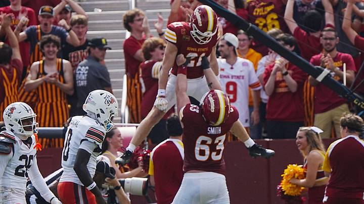 Iowa State's Aiden Flora (21) celebrates with Braden Smith (63) after scoring a touchdown against Bowling Green during the first quarter on Sept. 19, 2026, at Jack Trice Stadium in Ames, Iowa. Iowa State's Aiden Flora (21) celebrates with Braden Smith (63) after scoring a touchdown against Bowling Green during the first quarter on Sept. 19, 2026, at Jack Trice Stadium in Ames, Iowa.
