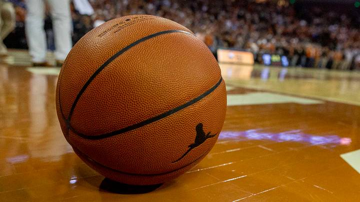 Texas Longhorns basketball during a timeout against Oklahoma Sooners at Frank Erwin Center. Texas Longhorns basketball during a timeout against Oklahoma Sooners at Frank Erwin Center.