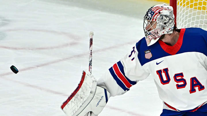 Connor Hellebuyck in action against Germany in men's ice hockey tournament play during the Milano Cortina 2026 Olympic Winter Games.