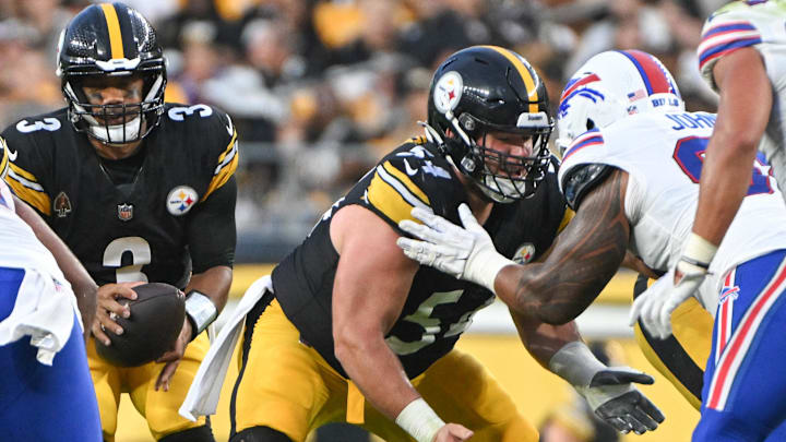 Aug 17, 2024; Pittsburgh, Pennsylvania, USA;  Pittsburgh Steelers center Zach Frazier (54) blocks against the Buffalo Bills during the first quarter at Acrisure Stadium. Mandatory Credit: Barry Reeger-Imagn Images