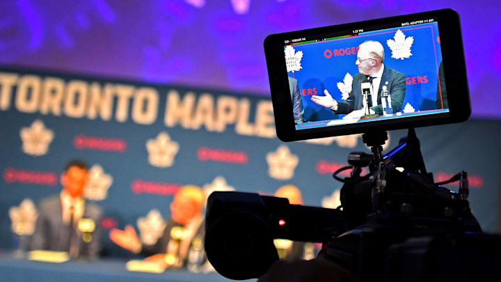 May 4, 2026; Toronto, Ontario, CANADA;  Maple Leaf Sport and Entertainment CEO Keith Pelley is shown on a video camera monitor as he introduces the Toronto Maple Leafs new general manager John Chayka during an introductory news conference at Real Sports Bar and Grill. Mandatory Credit: Dan Hamilton-Imagn Images