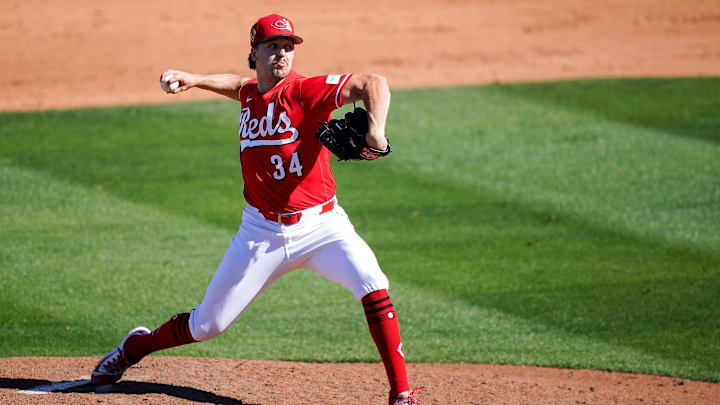 Cincinnati Reds pitcher Connor Phillips (34) throws a pitch in the fifth inning of a Cactus League game between the Cincinnati Reds and Seattle Mariners, Sunday, Feb. 22, 2026, at Goodyear Ballpark in Goodyear, Ariz.