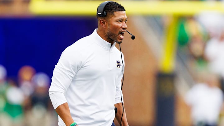 Notre Dame head coach Marcus Freeman celebrates after an interception by cornerback Christian Gray during the first half of a NCAA football game against Purdue at Notre Dame Stadium on Saturday, Sept. 20, 2025, in South Bend.
