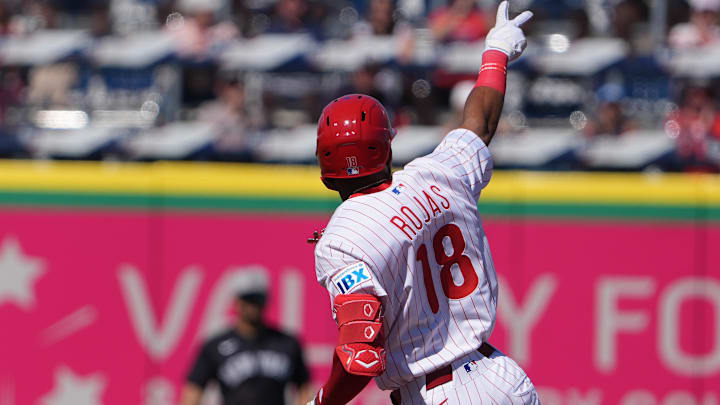 Feb 27, 2025; Clearwater, Florida, USA; Philadelphia Phillies outfielder Johan Rojas (18) waves to the fans after hitting a two-run home run against the New York Yankees during the second inning at BayCare Ballpark.
