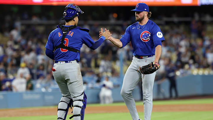 Sep 10, 2024; Los Angeles, California, USA; Chicago Cubs relief pitcher Porter Hodge (37) and catcher Miguel Amaya (9) celebrate a victory after defeating the Los Angeles Dodgers at Dodger Stadium. Sep 10, 2024; Los Angeles, California, USA; Chicago Cubs relief pitcher Porter Hodge (37) and catcher Miguel Amaya (9) celebrate a victory after defeating the Los Angeles Dodgers at Dodger Stadium.