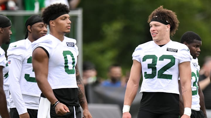 Jul 25, 2024; Florham Park, NJ, USA; New York Jets running back Isaiah Davis (32) chats with running back Braelon Allen (0) during training camp at Atlantic Health Jets Training Center. Jul 25, 2024; Florham Park, NJ, USA; New York Jets running back Isaiah Davis (32) chats with running back Braelon Allen (0) during training camp at Atlantic Health Jets Training Center.