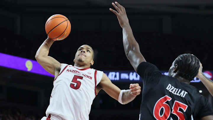 Arkansas Razorbacks guard Darius Acuff Jr (5) goes up for a dunk during the second half against the Cincinnati Bearcats at Bud Walton Arena. Arkansas won 89-61. 