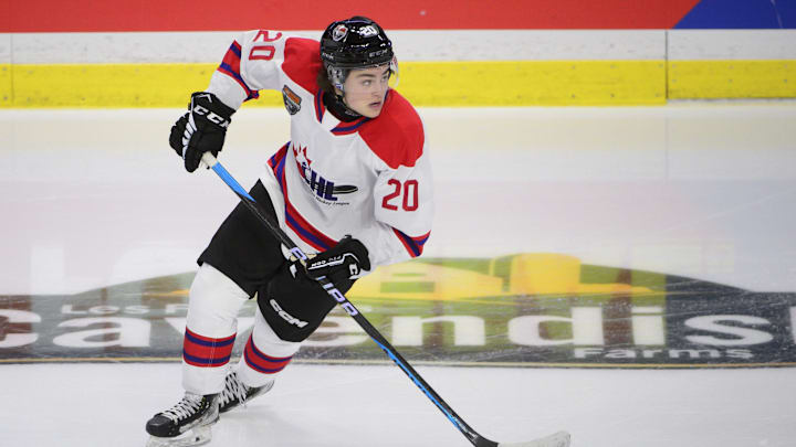 Jan 25, 2023; Langley, BC, CANADA; CHL Top Prospects team white forward Luca Pinelli (20) skates during the second period in the 2023 CHL Top Prospects ice hockey game at Langley Events Centre. Mandatory Credit: Anne-Marie Sorvin-Imagn Images