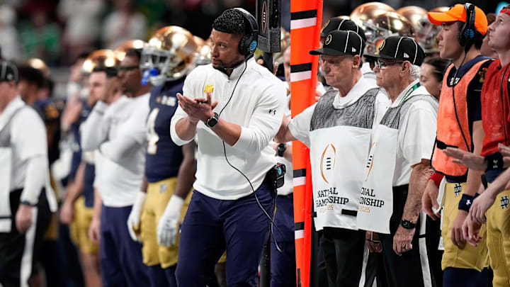 Notre Dame Fighting Irish head coach Marcus Freeman watches his team against Ohio State Buckeyes in the second quarter during the College Football Playoff championship at Mercedes-Benz Stadium in Atlanta on January 20, 2025. Notre Dame Fighting Irish head coach Marcus Freeman watches his team against Ohio State Buckeyes in the second quarter during the College Football Playoff championship at Mercedes-Benz Stadium in Atlanta on January 20, 2025.
