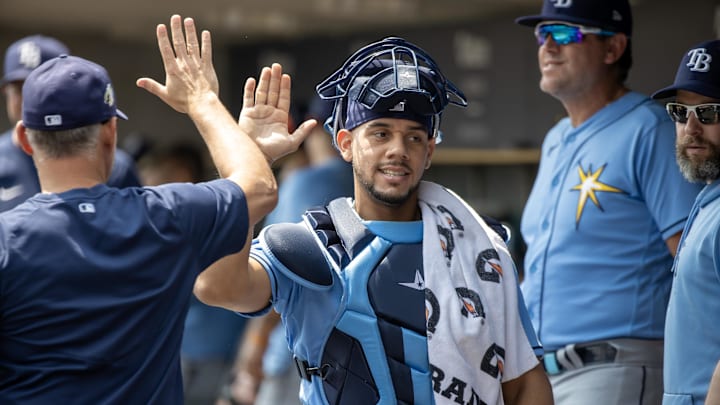 Aug 5, 2023; Detroit, Michigan, USA; Tampa Bay Rays catcher Rene Pinto (50) hi-fives teammates before the game against the Detroit Tigers at Comerica Park. Aug 5, 2023; Detroit, Michigan, USA; Tampa Bay Rays catcher Rene Pinto (50) hi-fives teammates before the game against the Detroit Tigers at Comerica Park.