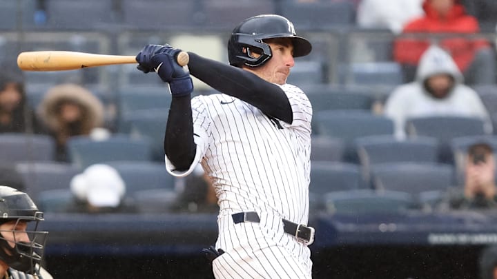 Apr 12, 2025; Bronx, New York, USA; New York Yankees outfielder Cody Bellinger (35) hits an RBI single against the San Francisco Giants during the fifth inning at Yankee Stadium. Apr 12, 2025; Bronx, New York, USA; New York Yankees outfielder Cody Bellinger (35) hits an RBI single against the San Francisco Giants during the fifth inning at Yankee Stadium.