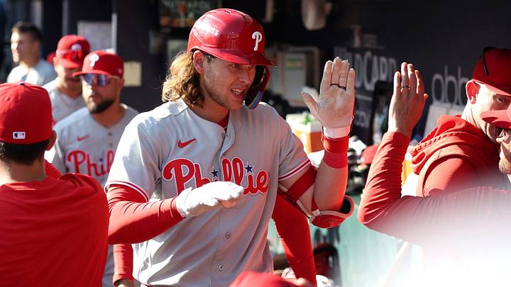 Sep 30, 2026; Cumberland, Georgia, USA;  Philadelphia Phillies first baseman Alec Bohm (28) celebrates in the dugout after hitting a solo home run against the Atlanta Braves in the tenth inning during game two of the Wildcard round for the 2026 MLB Playoffs at Truist Park.  Mandatory Credit: Brett Davis-Imagn Images