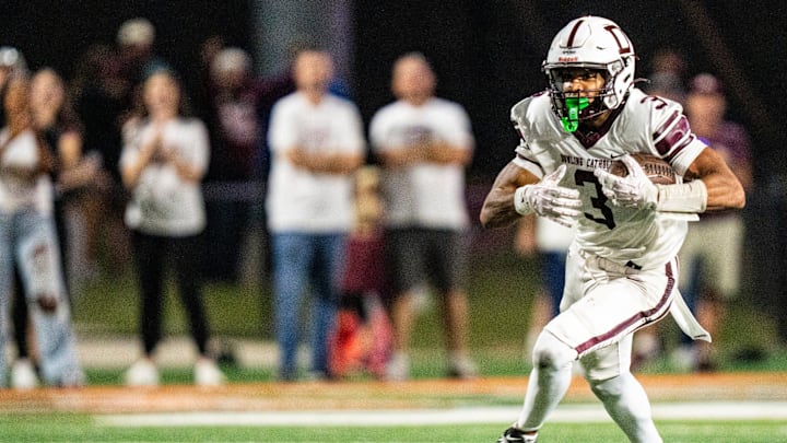 Dowling Catholic wide receiver Jeffrey Roberts (3) carries the ball during a high school football game between Valley and Dowling Catholic on Aug. 29, 2025, at Valley Stadium in West Des Moines, Iowa. Valley defeated Dowling Catholic 20-19.