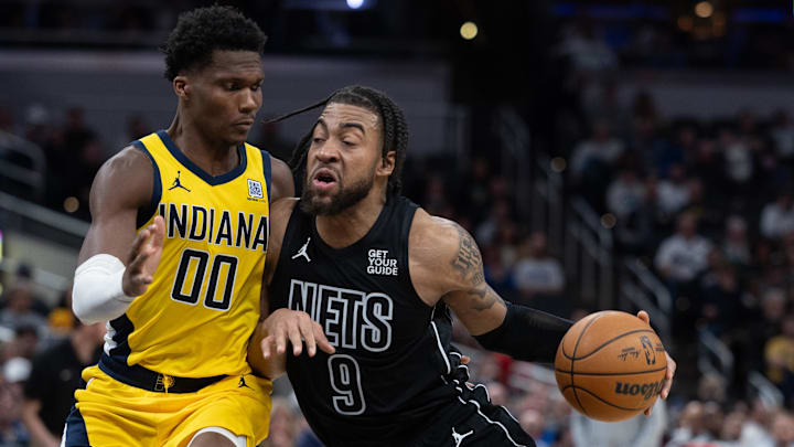 Mar 20, 2025; Indianapolis, Indiana, USA; Brooklyn Nets forward Trendon Watford (9) dribbles the ball while Indiana Pacers guard Bennedict Mathurin (00) defends in the second half at Gainbridge Fieldhouse. Mandatory Credit: Trevor Ruszkowski-Imagn Images Mar 20, 2025; Indianapolis, Indiana, USA; Brooklyn Nets forward Trendon Watford (9) dribbles the ball while Indiana Pacers guard Bennedict Mathurin (00) defends in the second half at Gainbridge Fieldhouse. Mandatory Credit: Trevor Ruszkowski-Imagn Images