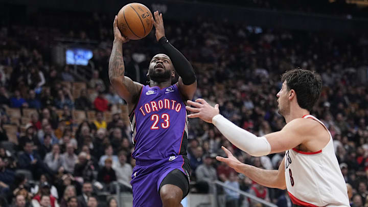 Apr 3, 2025; Toronto, Ontario, CAN; Toronto Raptors guard Jamal Shead (23) goes up to make a basket against Portland Trail Blazers forward Deni Avdija (8) during the first half at Scotiabank Arena. Mandatory Credit: John E. Sokolowski-Imagn Images Apr 3, 2025; Toronto, Ontario, CAN; Toronto Raptors guard Jamal Shead (23) goes up to make a basket against Portland Trail Blazers forward Deni Avdija (8) during the first half at Scotiabank Arena. Mandatory Credit: John E. Sokolowski-Imagn Images