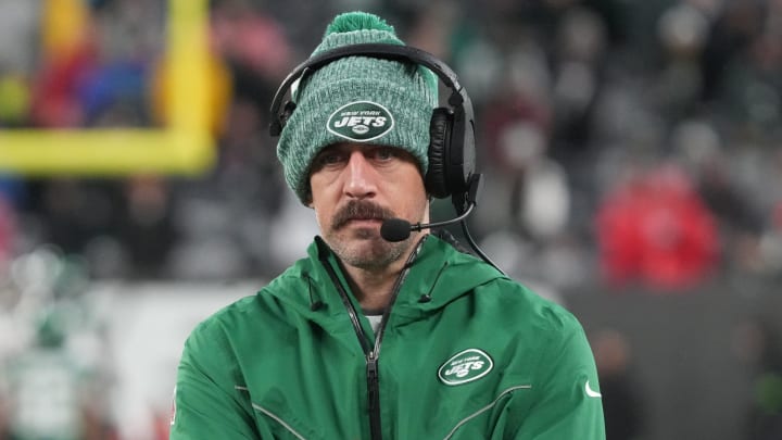 Aaron Rodgers stands on the sidelines during the Jets' loss to the Atlanta Falcons on Dec. 3.