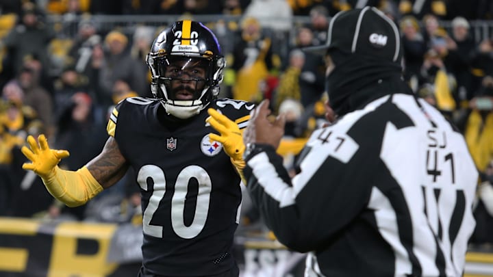 Jan 3, 2022; Pittsburgh, Pennsylvania, USA; Pittsburgh Steelers cornerback Cameron Sutton (20) reacts to side judge Boris Cheek (41) after being called for pass interference against the Cleveland Browns during the fourth quarter at Heinz Field. The Steelers won 26-14. Mandatory Credit: Charles LeClaire-USA TODAY Sports Jan 3, 2022; Pittsburgh, Pennsylvania, USA; Pittsburgh Steelers cornerback Cameron Sutton (20) reacts to side judge Boris Cheek (41) after being called for pass interference against the Cleveland Browns during the fourth quarter at Heinz Field. The Steelers won 26-14. Mandatory Credit: Charles LeClaire-USA TODAY Sports