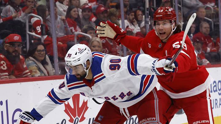Oct 2, 2026; Detroit, Michigan, USA;  Detroit Red Wings defenseman Moritz Seider (53) reacts to New York Rangers center Joseph Veleno (90) in the third period at Little Caesars Arena.  Mandatory Credit: Rick Osentoski-Imagn Images